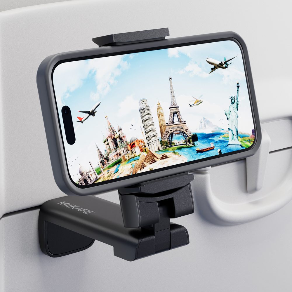 MiiKARE airplane phone holder clamped to a tray table on a flight